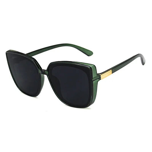 Elegant Kaelum butterfly sunglasses in deep green with dark grey lenses and subtle gold temple accents, offering UV protection and a chic, angular silhouette.