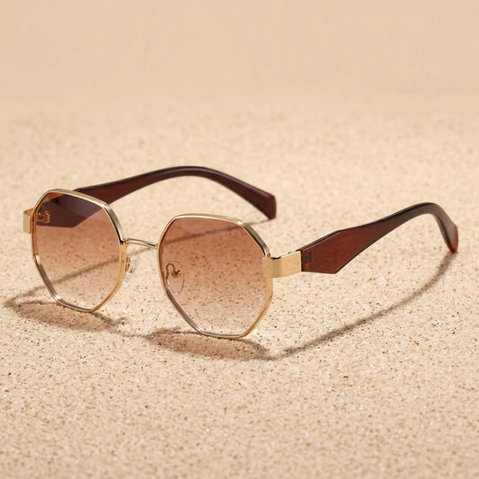 Sorvak gold-tone octagon metal frame sunglasses with gradient brown lenses and faceted brown acetate temples, offering UV400 protection.