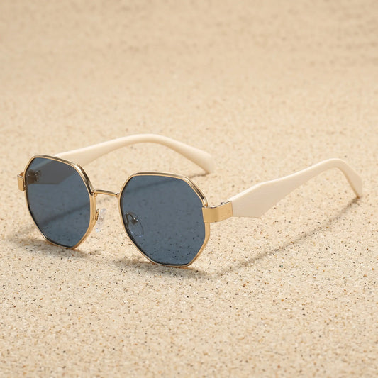 Sorvak gold-tone metal octagon frame sunglasses with gradient grey lenses and cream acetate temples.