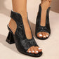 Black Aethel peep-toe block heel sandals with a woven texture upper and metallic chain ankle strap, shown from a three-quarter angle on feet.