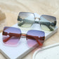 Two pairs of Aethel oversized square rimless sunglasses with gradient lenses and gold 'H' logo temple accents, displayed from a three-quarter angle.