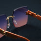 Oversized square sunglasses with gradient blue-pink lenses and distinctive gold-tone 'H' logo accents on the burnt orange temples, shown from a three-quarter angle.
