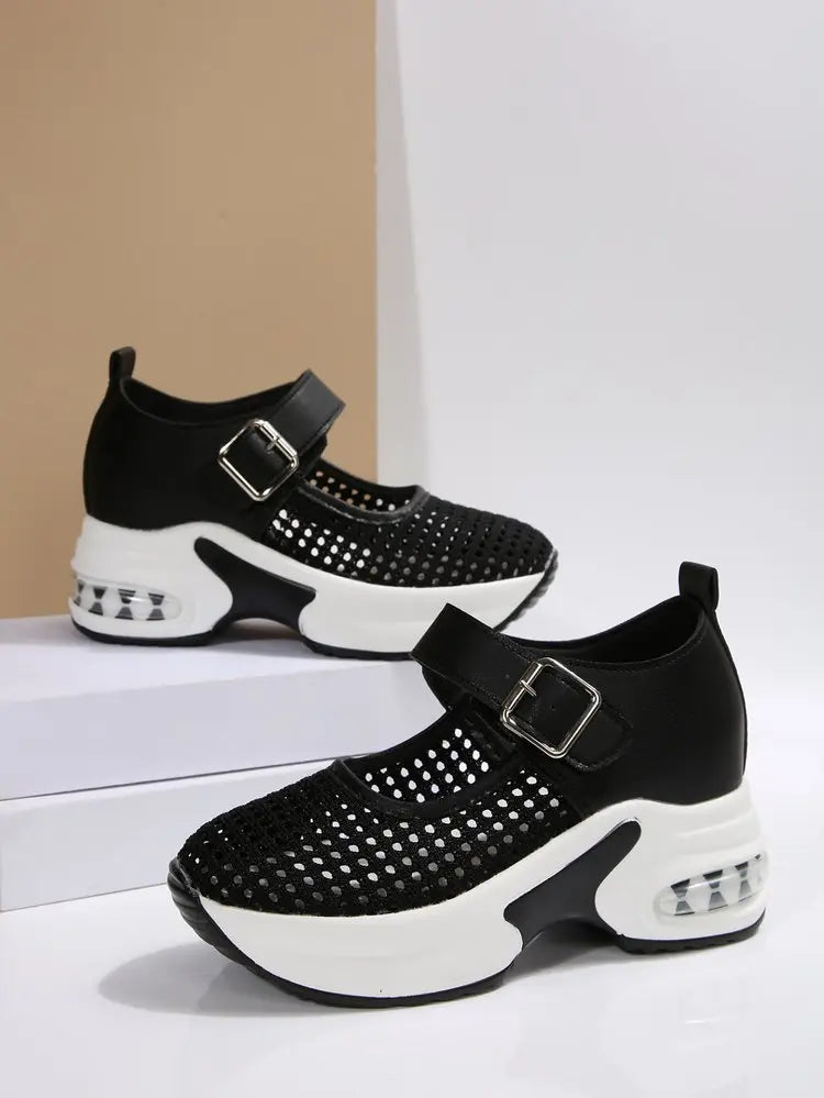 Baxar women's black breathable mesh sneakers featuring a Mary Jane-style adjustable buckle strap, a white platform sole, and a translucent air cushion heel.