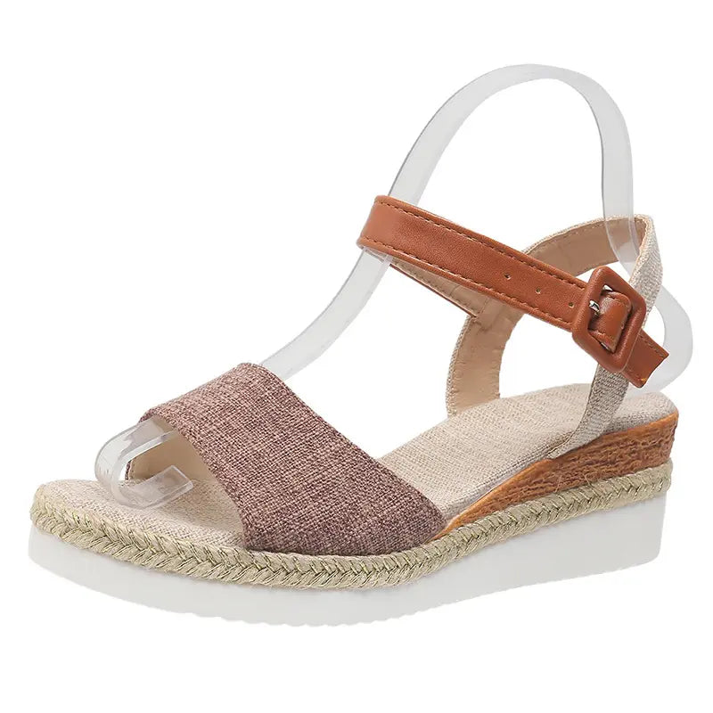 Elarae women's beige linen-like espadrille wedge sandals featuring a peep-toe and adjustable faux leather ankle strap with buckle closure.