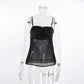 Black camisole top featuring a ruched satin-like bust and a sheer chiffon lower panel, displayed from a front view on a mannequin.