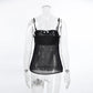 Black sheer camisole top featuring a ruched opaque satin-like bust and a delicate lower panel with thin adjustable spaghetti straps.