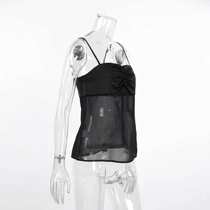 Black sheer camisole top on a mannequin, featuring a ruched satin-like bodice and thin adjustable spaghetti straps. The lower portion is made of delicate, translucent chiffon fabric.