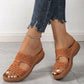 Briska women's beige laser-cut wedge sandals styled with ripped denim jeans and a sparkling anklet, showcasing comfort and bohemian chic. Side view.