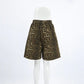 Gyzmar high-rise leopard print shorts, featuring a relaxed wide-leg silhouette and an elasticated waistband, presented front-on against a clean white studio background.