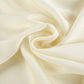 Close-up of the elegant ivory buttercream crinkle pleat fabric, showcasing its distinctive textured finish and soft drape for the two-piece set.