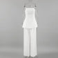 Ivory linen strapless bandeau top and wide-leg pants set displayed from the front on a mannequin against a studio background. This elegant ensemble features a flowing silhouette.