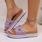 Jelani embellished platform slide sandals in lavender, worn on a woman's feet, showcasing intricate bead and rhinestone detailing on the straps and a cork sole with woven midsole.