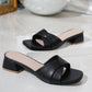 Kaelan Midnight Black PU leather slide sandals featuring a modern square toe, a twisted strap vamp, and a low 4cm block heel with a tan cap.