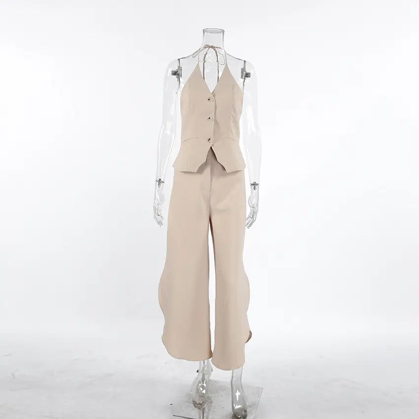 Kaelen beige two-piece ensemble featuring a V-neck halter vest with three tonal buttons and flowing wide-leg palazzo trousers with a side split hem.