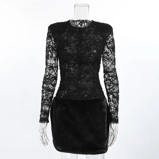 Elegant black Kaelen lace mini dress featuring a sheer floral lace bodice and sleeves with structured shoulders, a high waist, and a plush faux fur skirt. Front view on a mannequin.