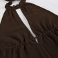 Close-up of a Kaelen boho halter top in deep brown chiffon, showcasing the keyhole bust cutout, ruched neckline, and tie closure details.
