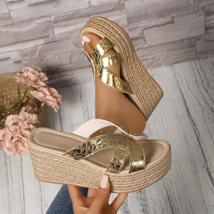 Kaelen champagne gold cracked metallic espadrille wedge sandals with a platform sole, shown from a three-quarter angle.
