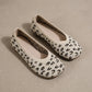 A pair of Kaelen women's slip-on ballet flats in classic leopard print knit, presented from a three-quarter angle on a neutral studio surface.