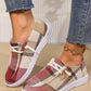 Kaelen women's plaid canvas slip-on loafers with white laces and white rubber soles, worn with denim jeans and a gold ankle bracelet.