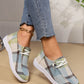 Kaelen women's plaid canvas loafers with decorative white laces and white rubber soles, shown on feet with distressed denim jeans.