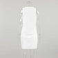 Back view of the Kaelen white linen-blend sleeveless wrap top and high-waisted A-line mini skirt set, showcasing the adjustable tie detail and clean silhouette.