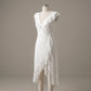 Kaelis white lace V-neck midi dress featuring cascading ruffled V-neckline, sleeveless design, and an asymmetrical tiered ruffle hem, displayed on a mannequin.