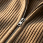Kaelon ribbed knit zip cardigan in beige — close-up detail showing the smooth-glide metal zipper and architectural vertical texture.