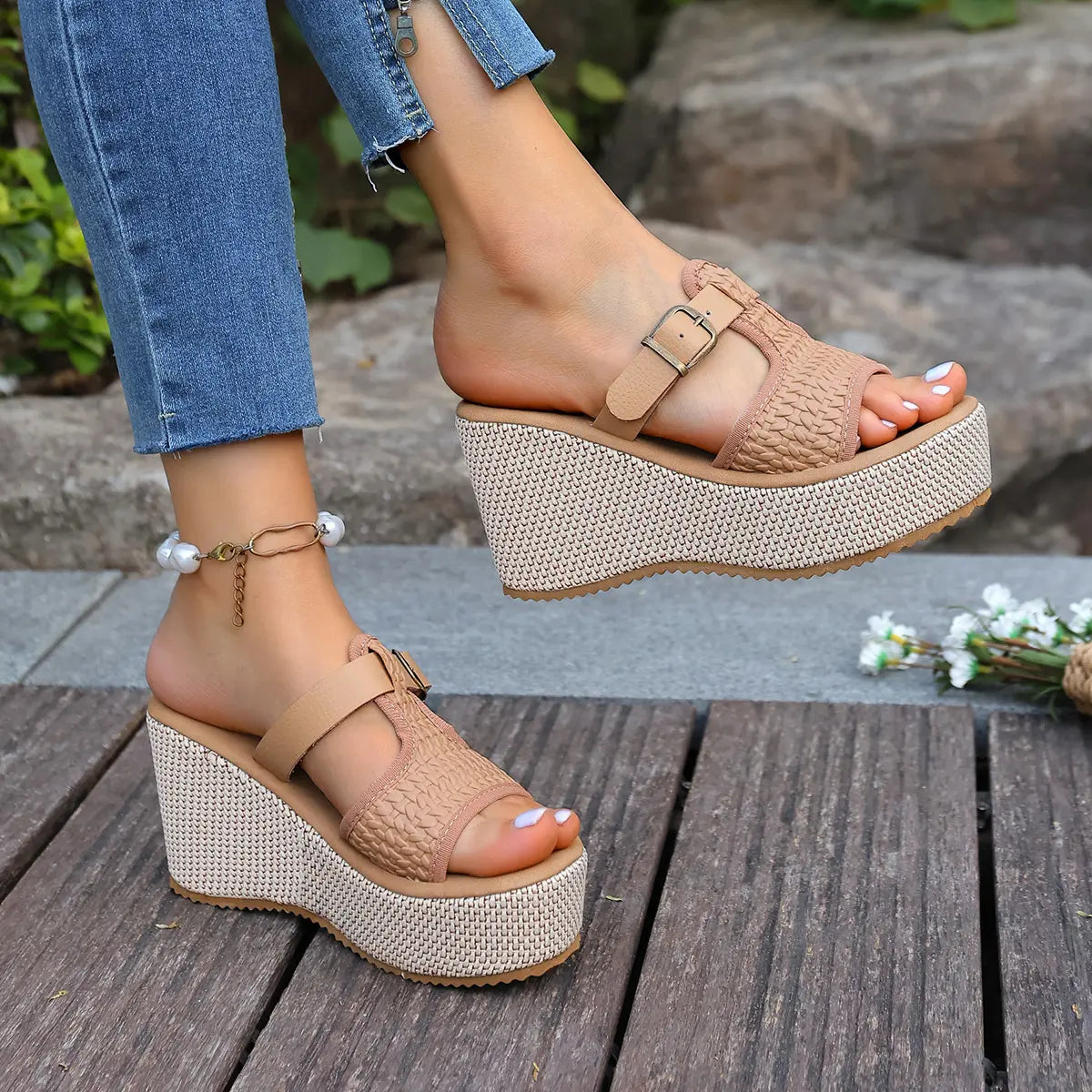 Women's Kalix woven platform espadrille wedge sandals in tan, styled with denim and a pearl anklet, shown in a lifestyle setting.