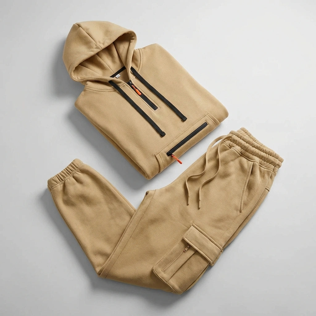 Krovax Tech Fleece Urban Utility Set in Sand Dune beige — flat lay view showing half-zip hoodie and cargo joggers with tactical pockets.