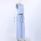 Three-quarter side view of a light blue Zelphira sleeveless ruffled crop top and matching wide-leg trousers set displayed on a mannequin.