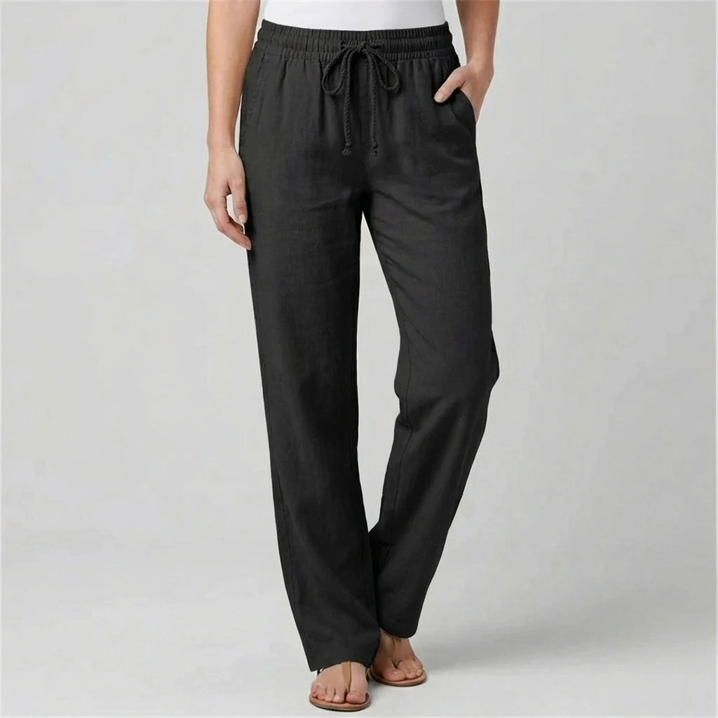 Luvana women's black linen blend trousers with elastic drawstring waist and straight-leg fit, shown from the front.