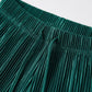 Close-up of the elasticated waistband and vertical micro-pleated texture of Luvia wide leg pleated trousers in deep teal with drawstring.