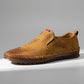 Mokasso men's comfort driving loafer in saddle brown vegan leather, side profile view showing hand-stitched details and embossed logo.