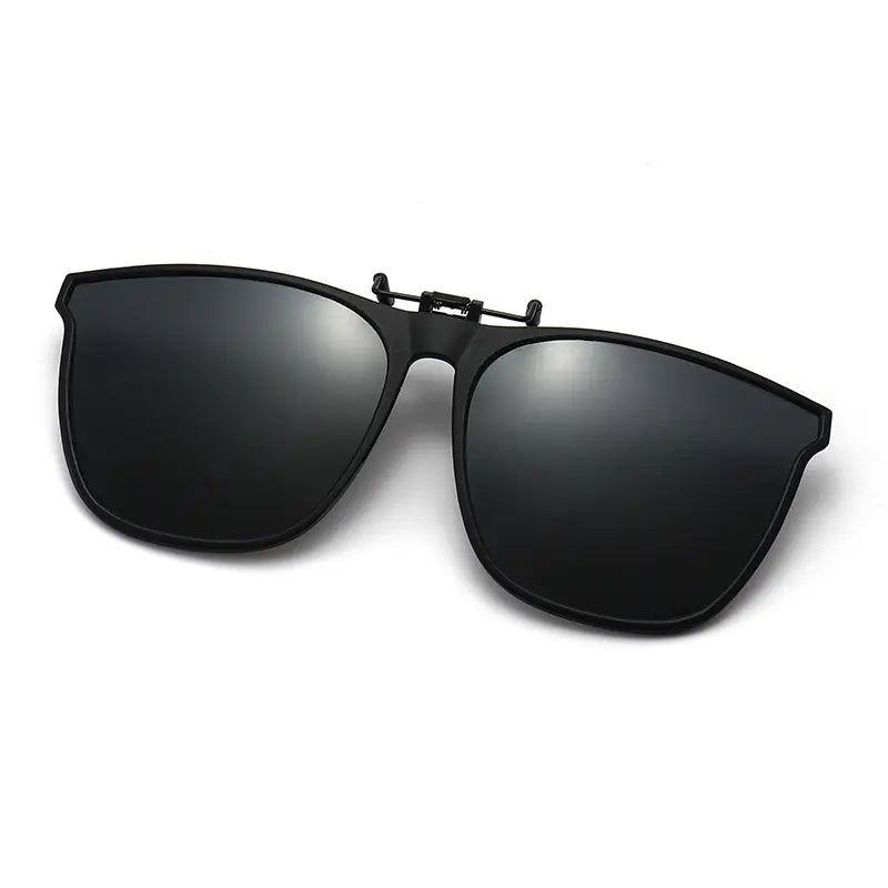 Matte black metal clip-on sunglasses with classic square polarized lenses, presented from a front-facing angle on a clean white background.
