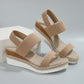 Natural khaki espadrille wedge sandals with textured mesh upper, peep toe, parallel elastic straps, and a woven jute platform sole.