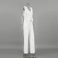 Nyxos women's white sleeveless V-neck vest and high-rise wide-leg trousers set displayed on a mannequin, showcasing a sophisticated tailored silhouette.