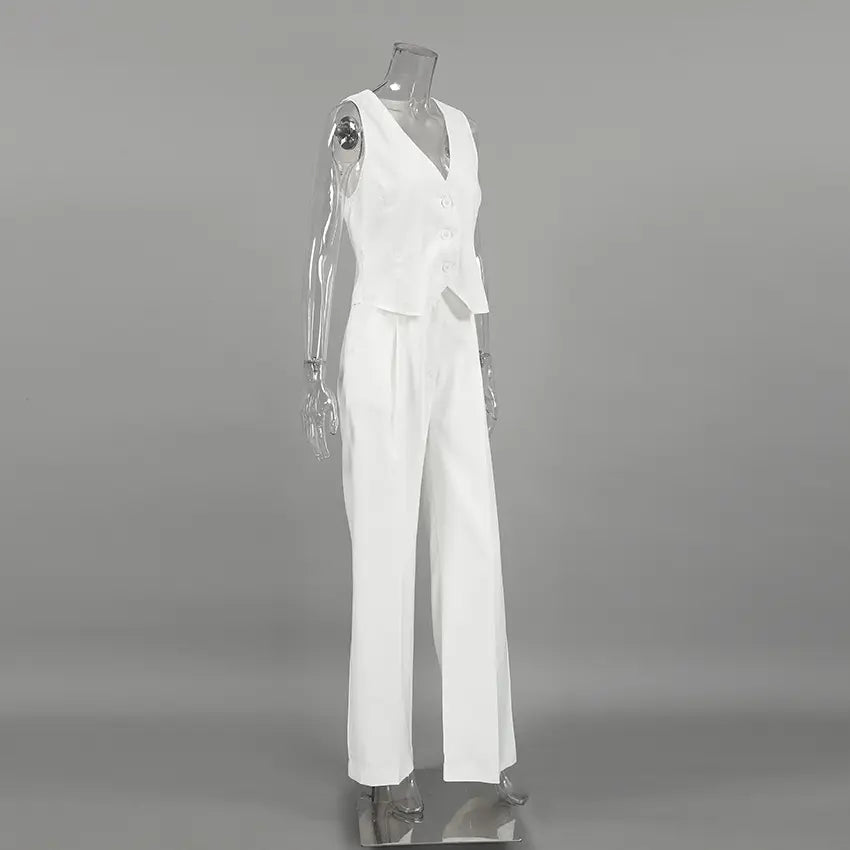 Nyxos women's white sleeveless V-neck vest and high-rise wide-leg trousers set displayed on a mannequin, showcasing a sophisticated tailored silhouette.