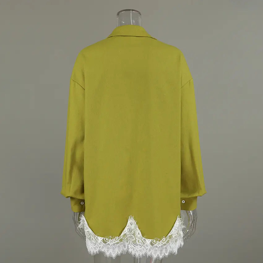 Back view of an olive green, oversized, long-sleeved linen-blend shirt featuring delicate white floral lace trim along the hem, presented on a mannequin.