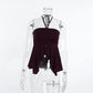 Deep plum ribbed halter neck crop top with a plunging neckline, asymmetric high-low hem, and a dramatic center front slit, displayed on a mannequin.