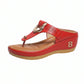 Vibrant red platform thong sandal with a perforated synthetic straw-like strap adorned with a gold-tone ring hardware and an embossed 'B' logo on the wedge heel.