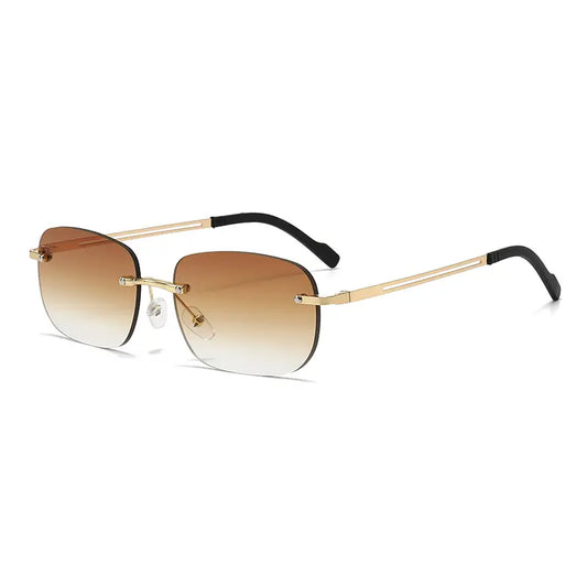 Rimless oval sunglasses with gradient brown lenses and polished gold-tone metal temples featuring black ear tips.