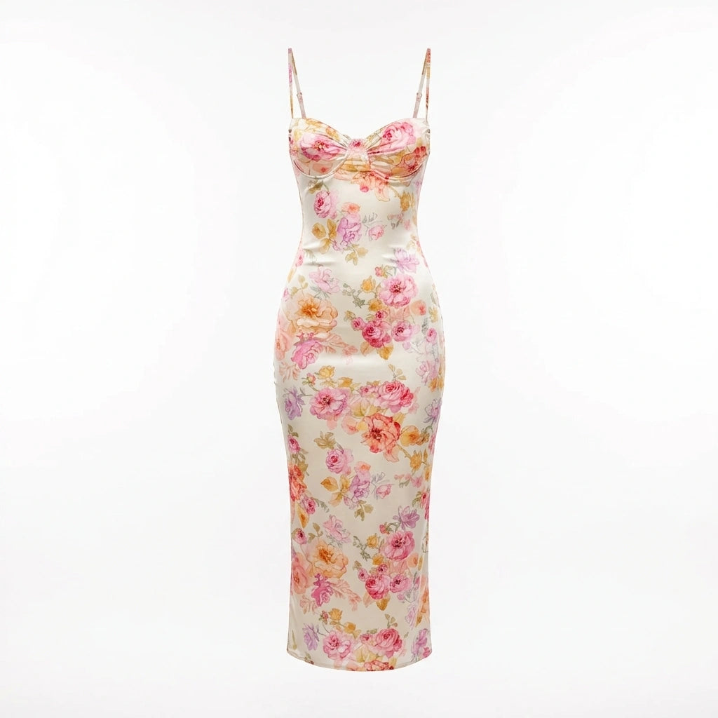 Roselle floral satin slip dress in cream with vintage rose print, featuring a structured corset-style bust and spaghetti straps — front view.