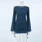 Fitted ribbed knit mini dress in deep sapphire blue, featuring a crew neck, dramatic long bell sleeves with a lettuce hem, and adjustable side ruching. Presented on a mannequin from the front.