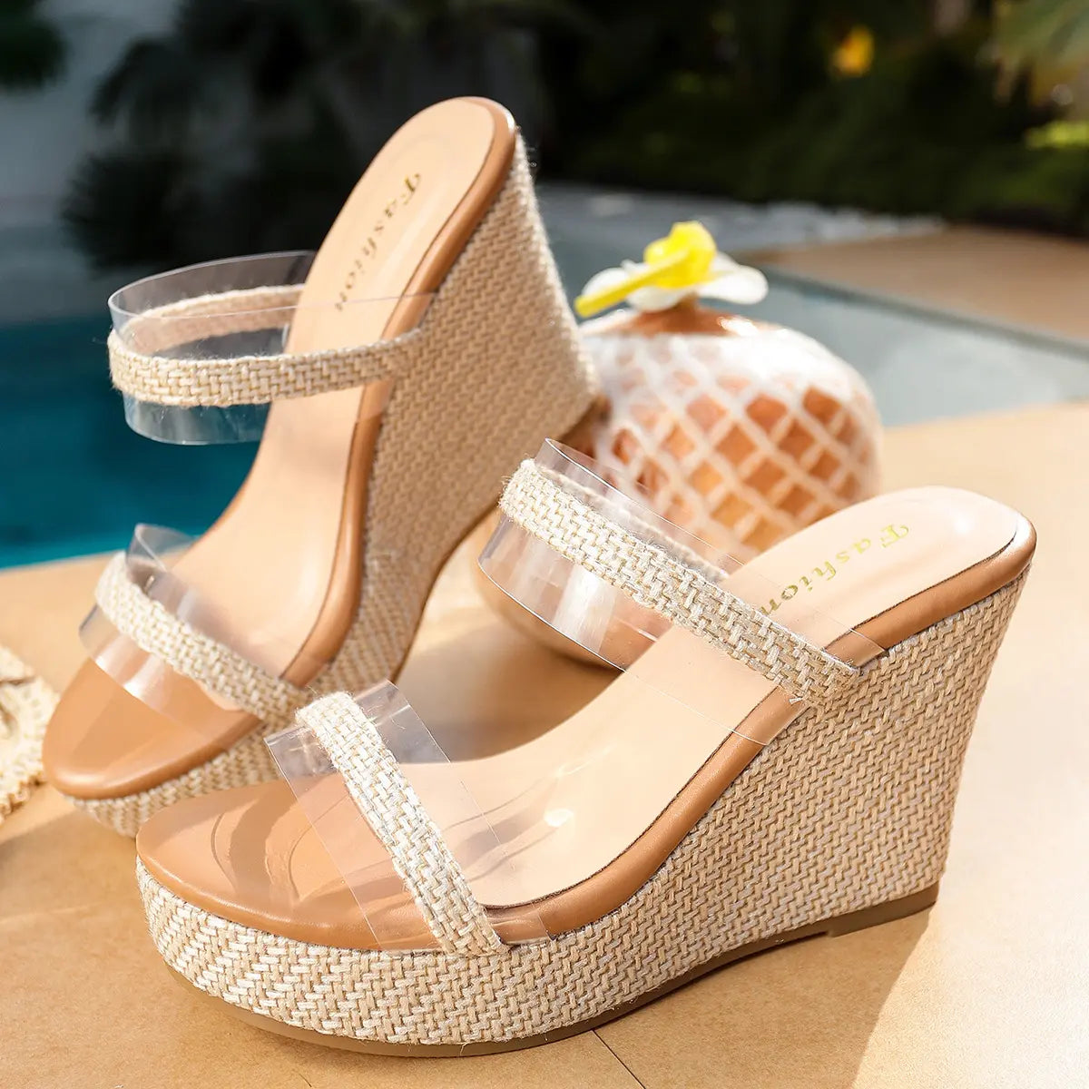 Seraph clear strap espadrille wedge sandals in natural ecru, showcasing the jute-wrapped platform wedge and open toe design with 'Fashion' detail on the footbed.