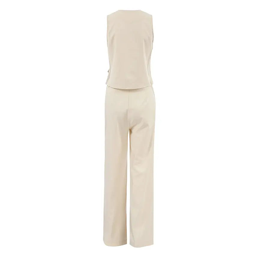 Back view of a beige linen-blend women's vest and wide-leg trouser set, showcasing the garment's silhouette and fabric texture.