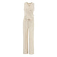 Women's beige linen blend set featuring a sleeveless vest with an asymmetrical wrap closure and V-neck, paired with full-length wide-leg trousers, displayed from the front.
