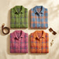 Vellura women's soft knit plaid shirts in four colors, featuring a brushed texture, point collars, and pearlized buttons, arranged in a grid.