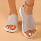 Beige breathable mesh peep-toe platform sandals with white layered soles and elastic heel straps, worn on feet with an anklet. Comfortable summer footwear.