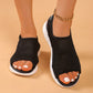 Black breathable mesh women's platform sandals with peep-toe and elastic heel strap, shown on feet with white nail polish and a gold ankle chain.