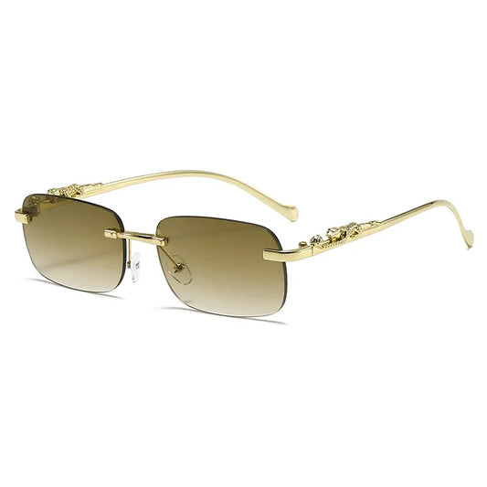 Vexiom Statement Leopard Sunglasses in gold-tone rimless square style with gradient charcoal grey lenses and detailed leopard head temple embellishments.